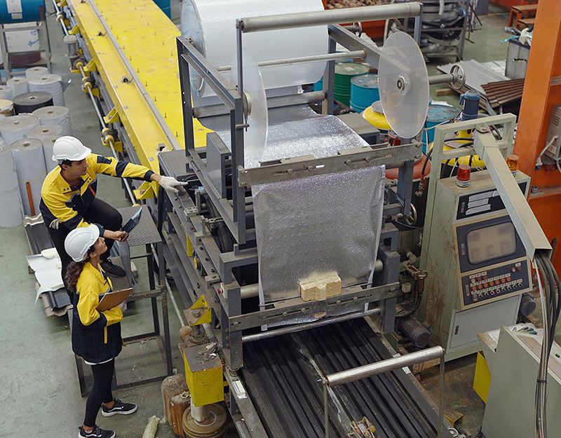 Factory workers in production process