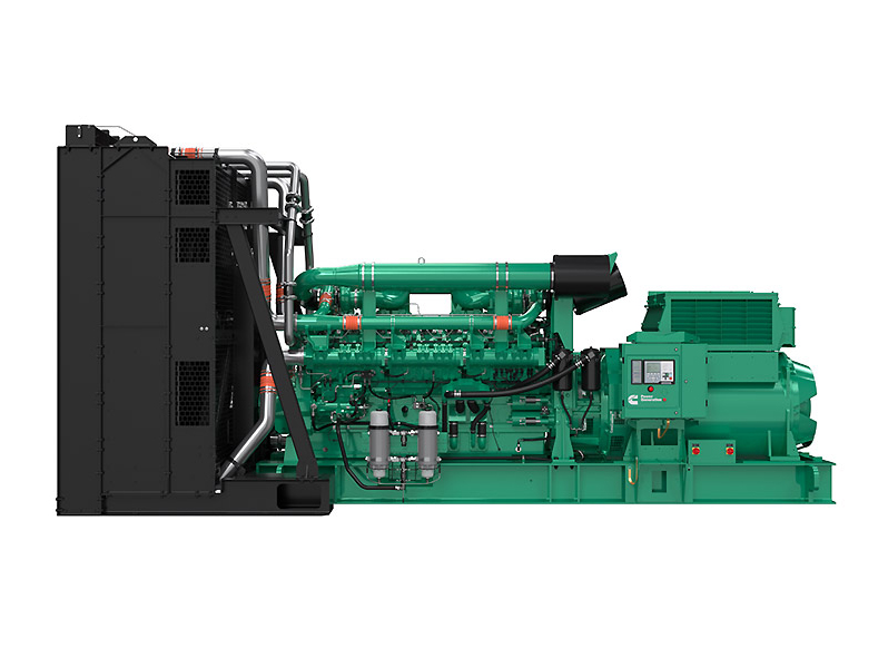 Large green diesel generator set with a black cooling radiator on the left and exposed engine components, viewed from the side.